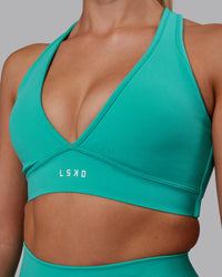 Woman wearing Stamina Sports Bra - Turquoise Tide | Thumbnail Index: 6