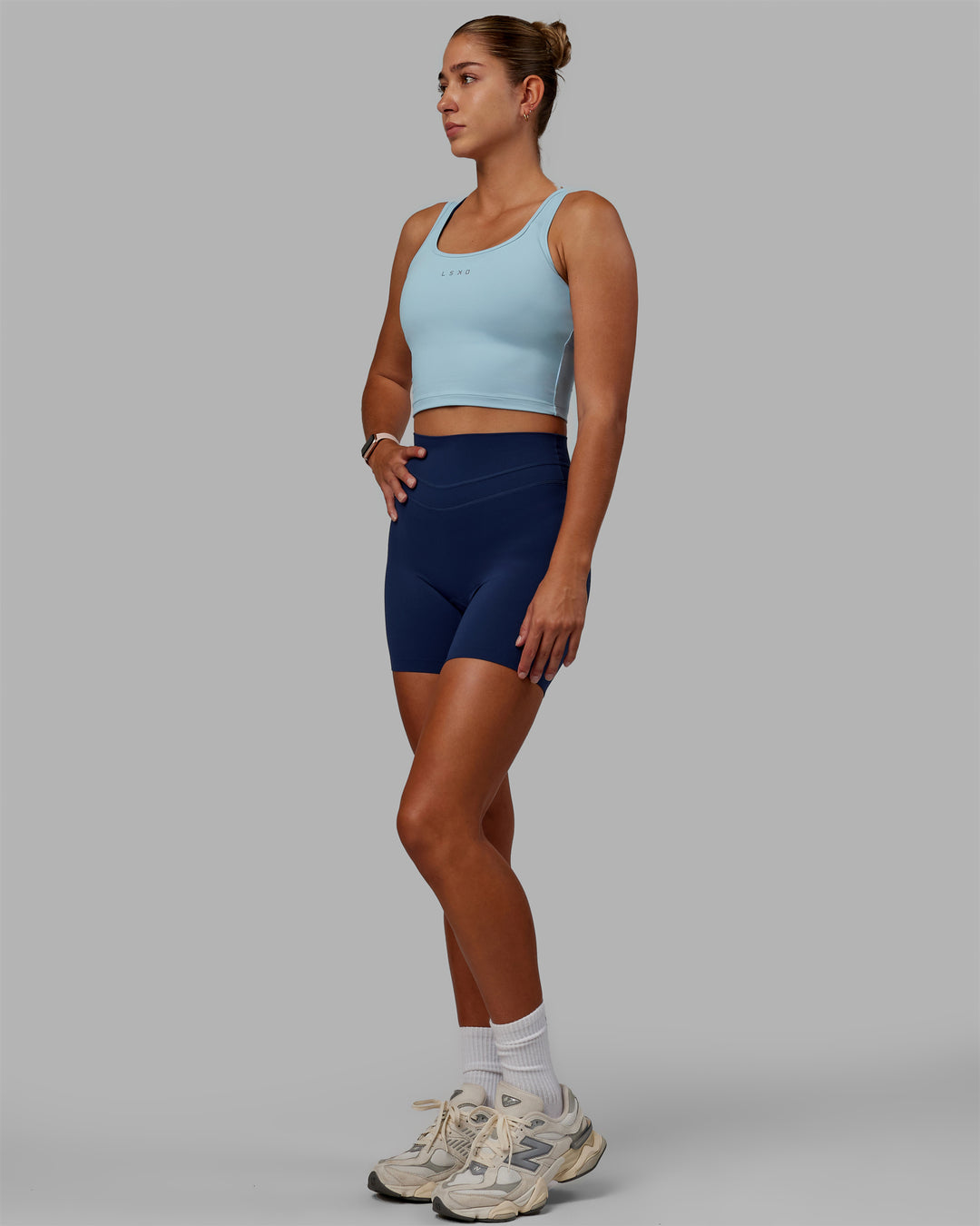 Woman wearing Staple Active Cropped Tank - Glacial Blue - view 5