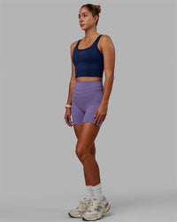 Woman wearing Staple Active Cropped Tank - Midnight Blue | Thumbnail Index: 3