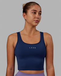 Woman wearing Staple Active Cropped Tank - Midnight Blue | Thumbnail Index: 0