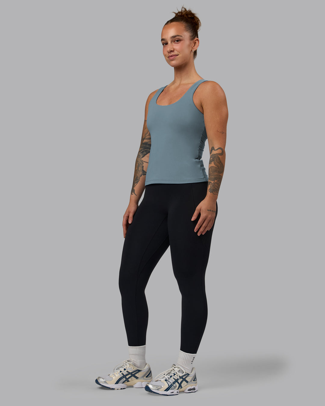 Woman wearing Staple Active Shelf Bra Tank - Elemental Blue - view 4