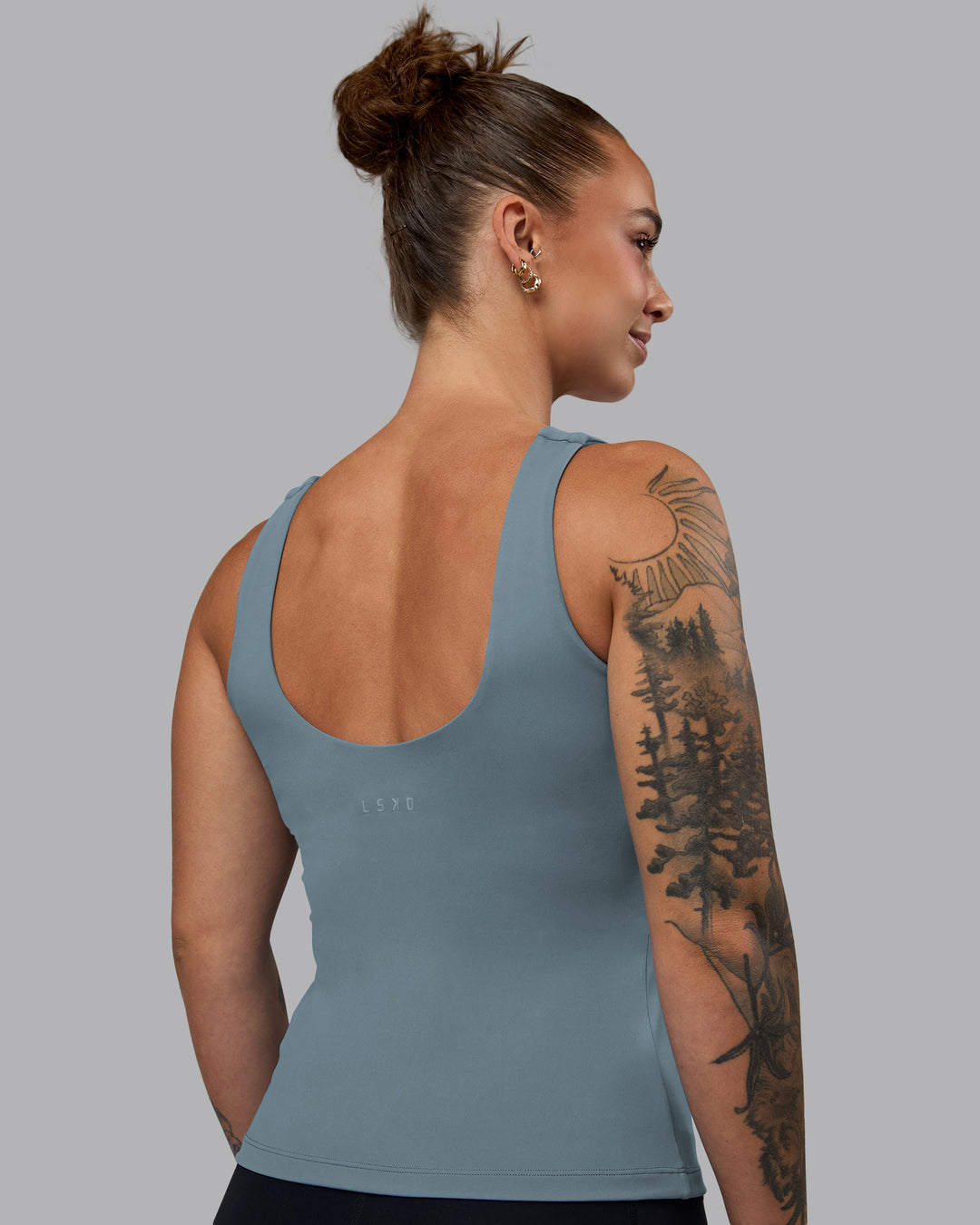 Woman wearing Staple Active Shelf Bra Tank - Elemental Blue - view 3