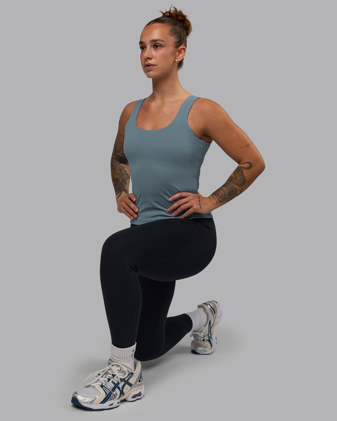 Woman wearing Staple Active Shelf Bra Tank - Elemental Blue - view 6