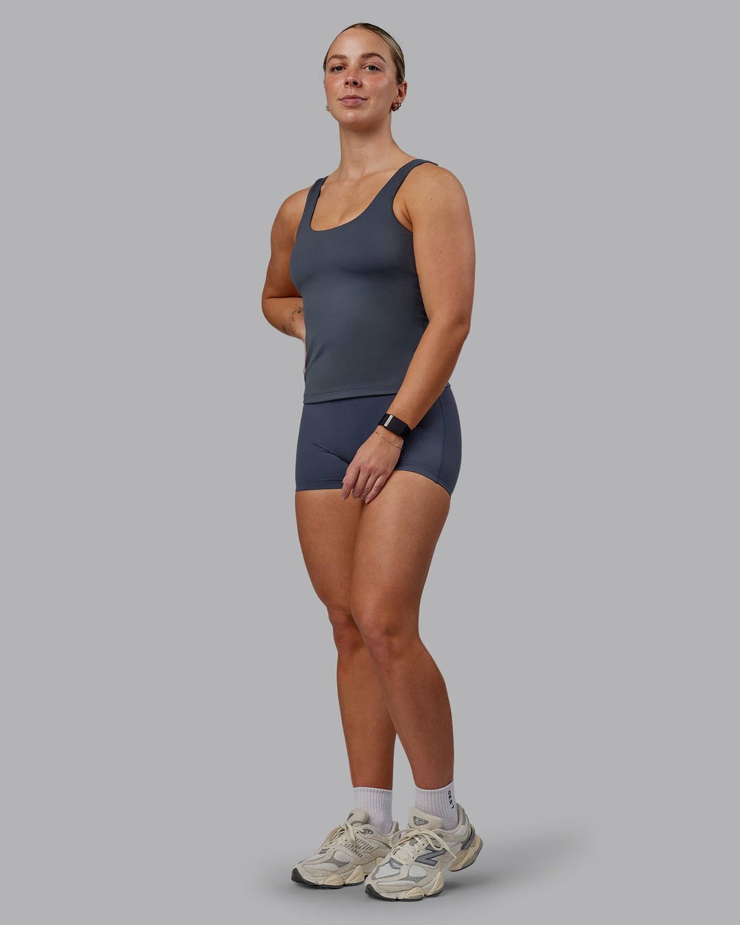 Woman wearing Staple Active Shelf Bra Tank - Turbulence - view 4