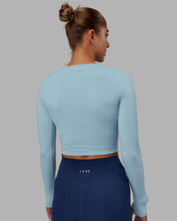 Woman wearing Staple LS Cropped Tee - Glacial Blue | Thumbnail Index: 3