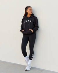 Woman wearing Structure Hoodie - Black-White | Thumbnail Index: 1