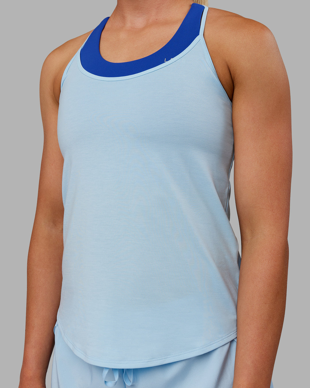 Woman wearing Swift Active Tank - Glacial Blue - view 6
