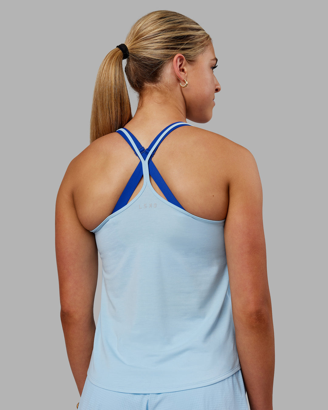 Woman wearing Swift Active Tank - Glacial Blue - view 4