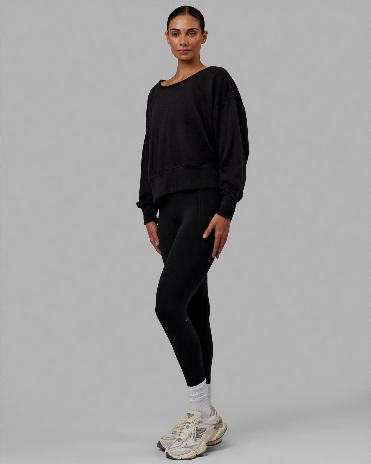 Woman wearing Tempo Sweater - Black
