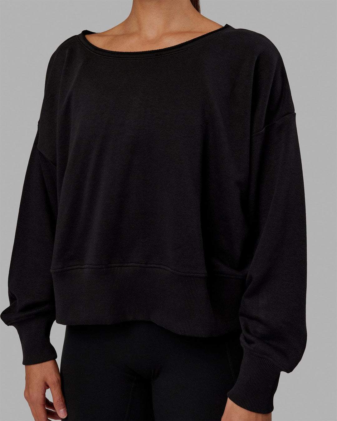 Woman wearing Tempo Sweater - Black - view 5