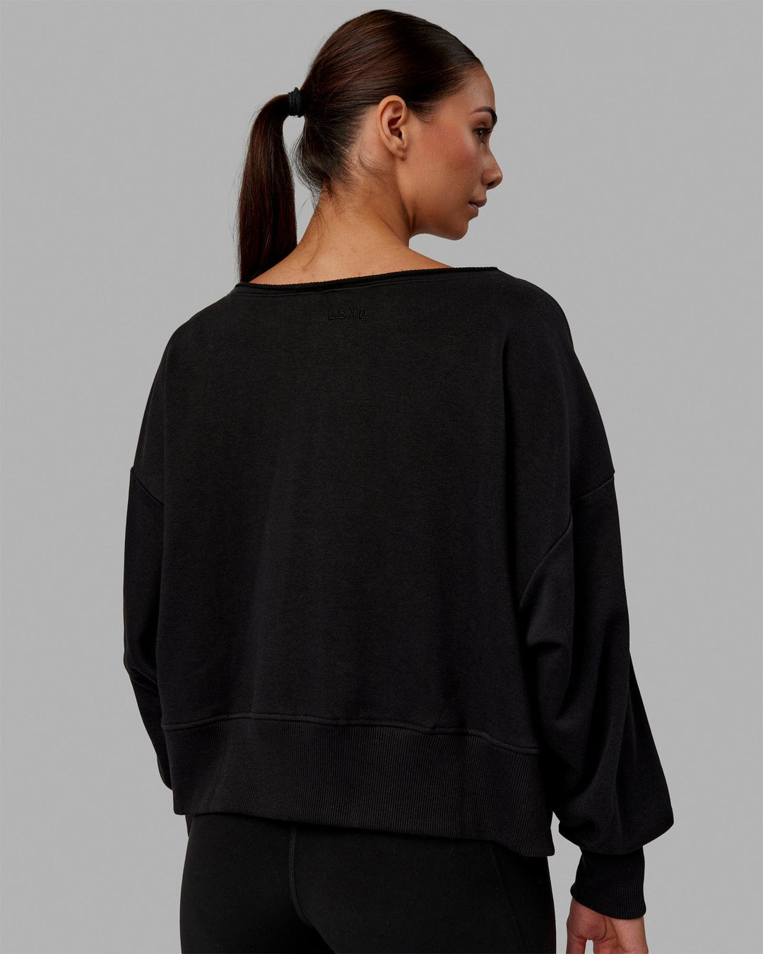 Woman wearing Tempo Sweater - Black - view 3