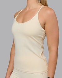 Woman wearing Transition CloudFLX Shelf Bra Tank - Ivory | Thumbnail Index: 4