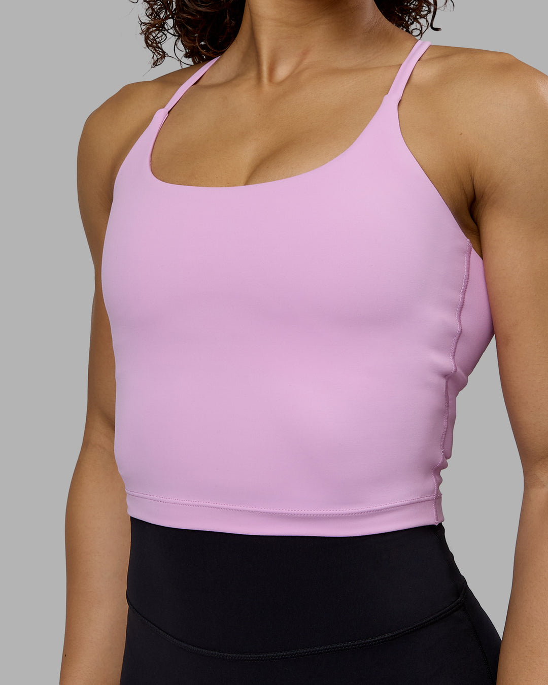 Woman wearing Twist Shelf Bra Tank - Pastel Orchid - view 7