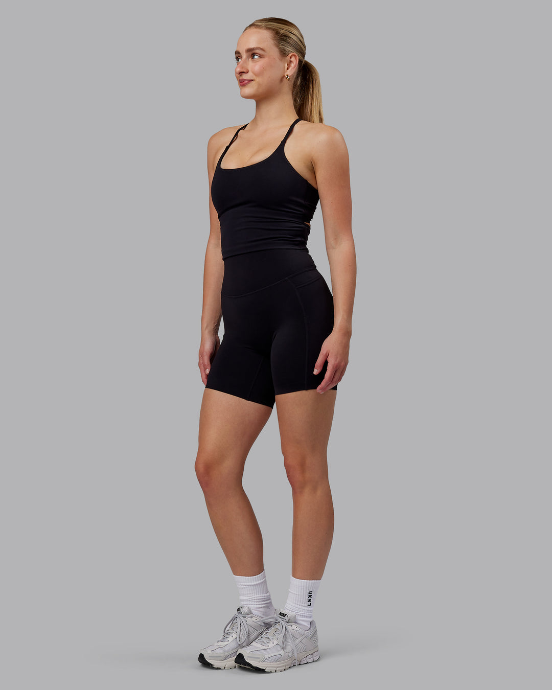 Woman wearing Twist Shelf Bra Tank - Black - view 6