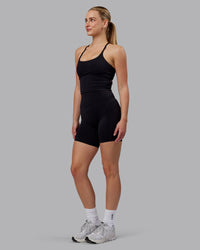 Woman wearing Twist Shelf Bra Tank - Black | Thumbnail Index: 5