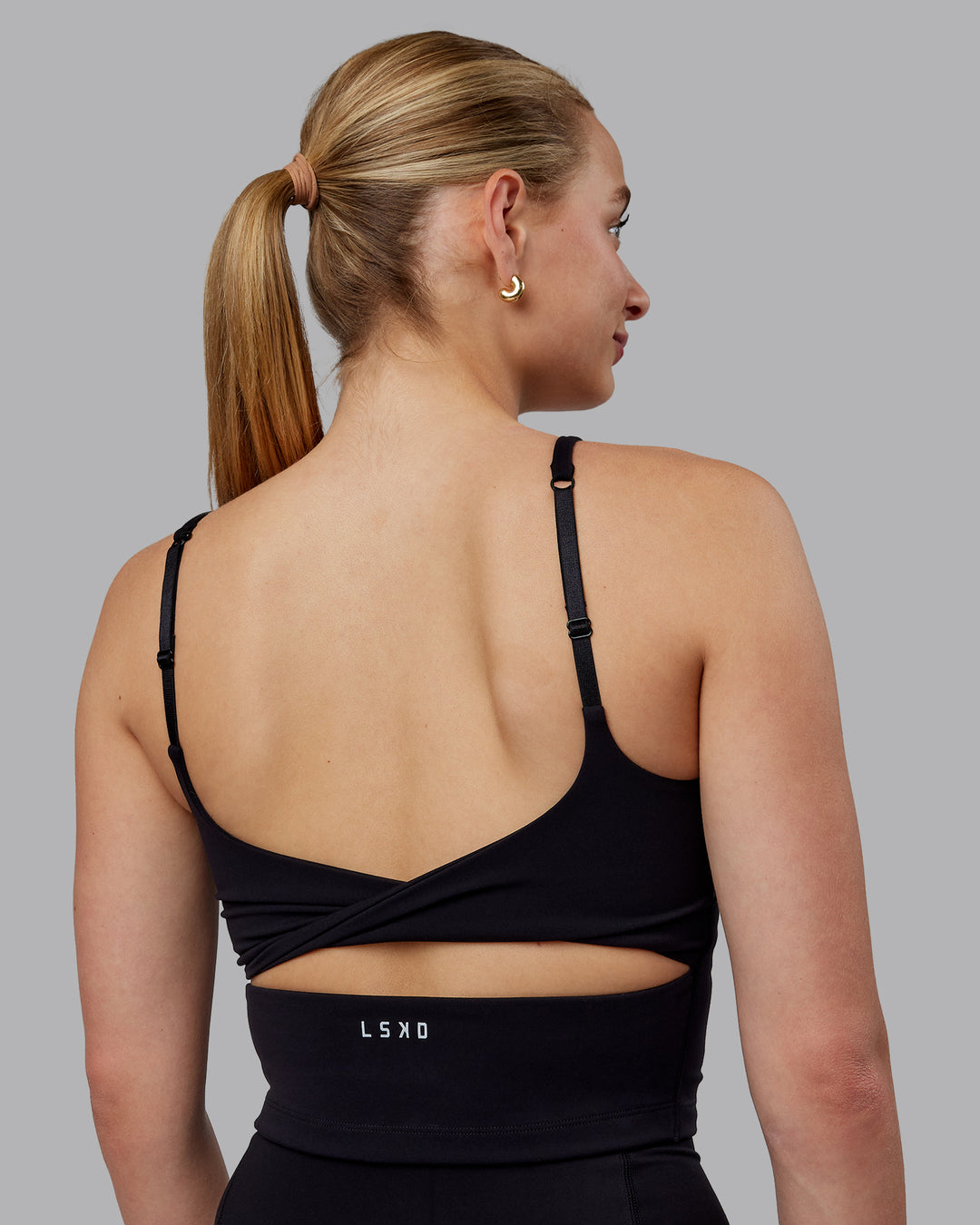 Woman wearing Twist Shelf Bra Tank - Black - view 8