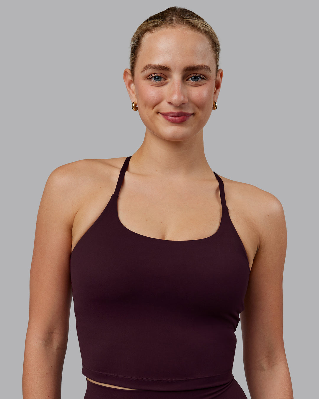 Woman wearing Twist Shelf Bra Tank - Mulberry - view 2