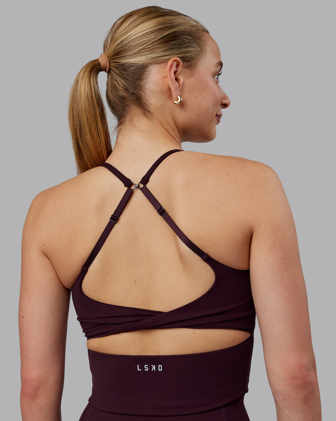 Woman wearing Twist Shelf Bra Tank - Mulberry - view 5