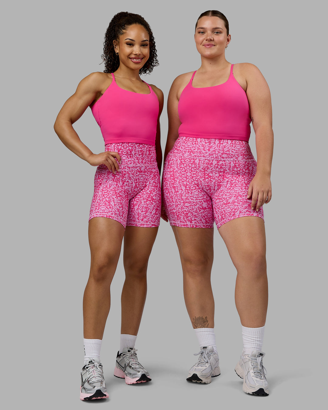 Woman wearing Twist Shelf Bra Tank - Ultra Pink - view 5