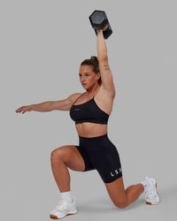 Woman wearing Lift Sports Bra - Black | Thumbnail Index: 6