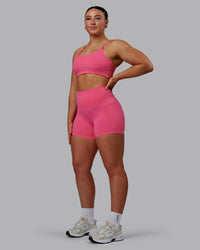 Woman wearing Twist Sports Bra - Carmine Rose | Thumbnail Index: 3