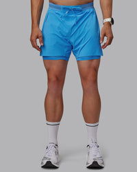 Man wearing UltraAir 5" Lined Performance Shorts - Azure Blue | Thumbnail Index: 6