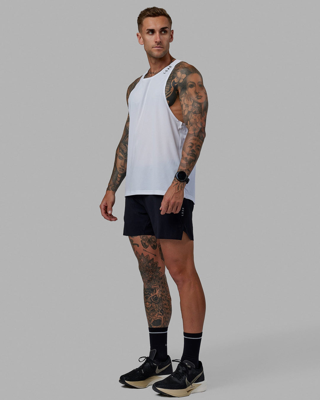 Man wearing UltraAir 5" Lined Performance Short - Black-Reflective - view 7