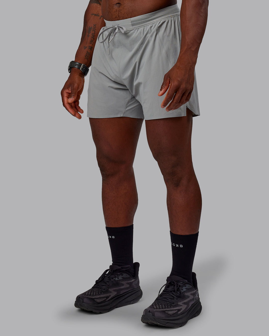 Man wearing UltraAir 5" Lined Performance Shorts - Circular Grey - view 1