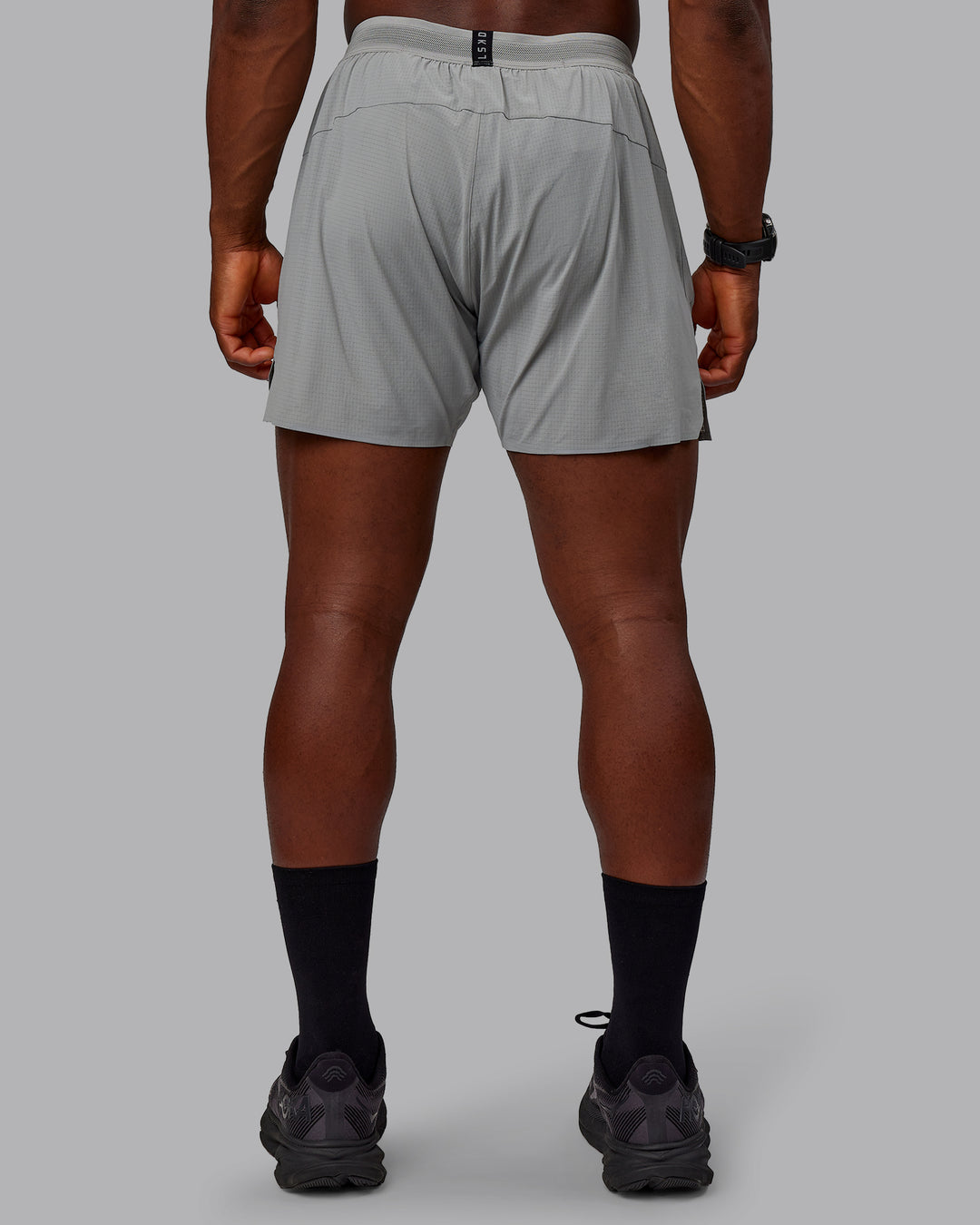 Man wearing UltraAir 5" Lined Performance Shorts - Circular Grey - view 2
