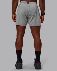 Man wearing UltraAir 5" Lined Performance Shorts - Circular Grey | Thumbnail Index: 1