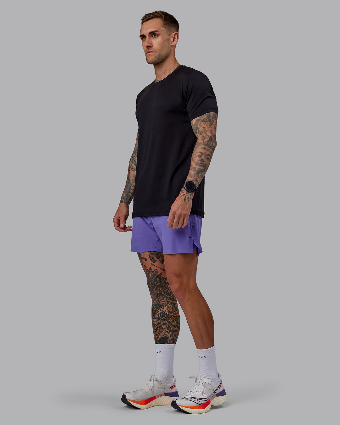 Man wearing UltraAir 5" Lined Performance Shorts - Dahlia Purple - view 4