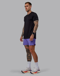 Man wearing UltraAir 5" Lined Performance Shorts - Dahlia Purple | Thumbnail Index: 3