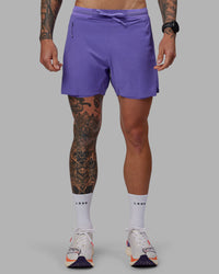 Man wearing UltraAir 5" Lined Performance Shorts - Dahlia Purple | Thumbnail Index: 8