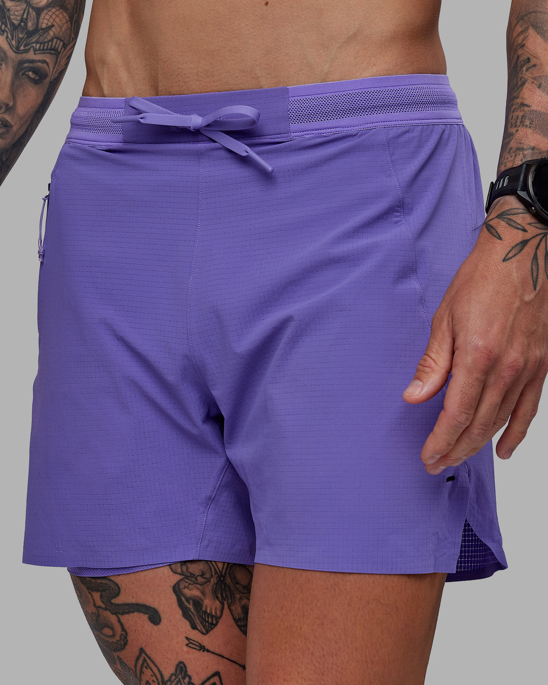Man wearing UltraAir 5" Lined Performance Shorts - Dahlia Purple - view 1
