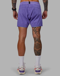 Man wearing UltraAir 5" Lined Performance Shorts - Dahlia Purple | Thumbnail Index: 7