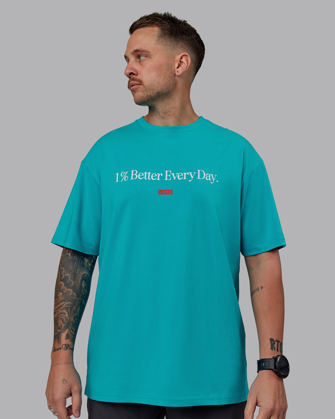 Man wearing Unisex 1% Better FLXCotton Tee Oversize - Blue Bird-White - view 3