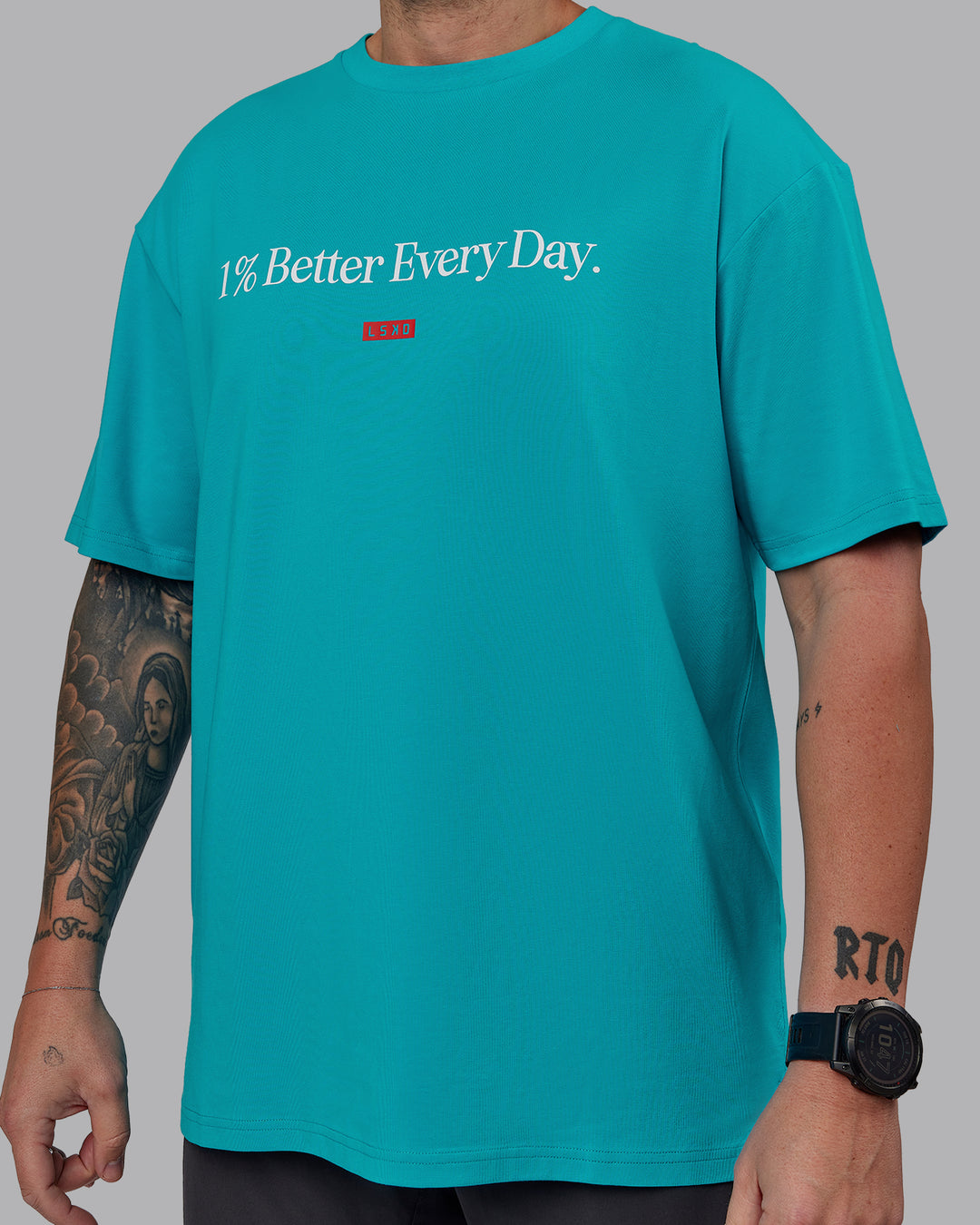 Man wearing Unisex 1% Better FLXCotton Tee Oversize - Blue Bird-White - view 9