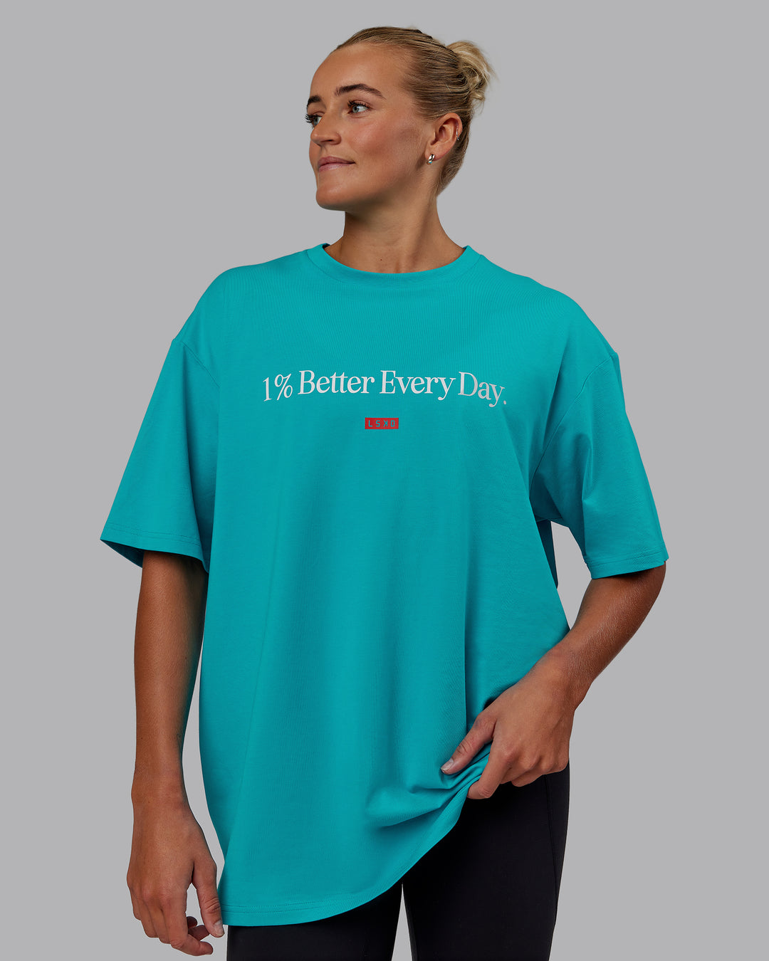 Woman wearing Unisex 1% Better FLXCotton Tee Oversize - Blue Bird-White - view 5