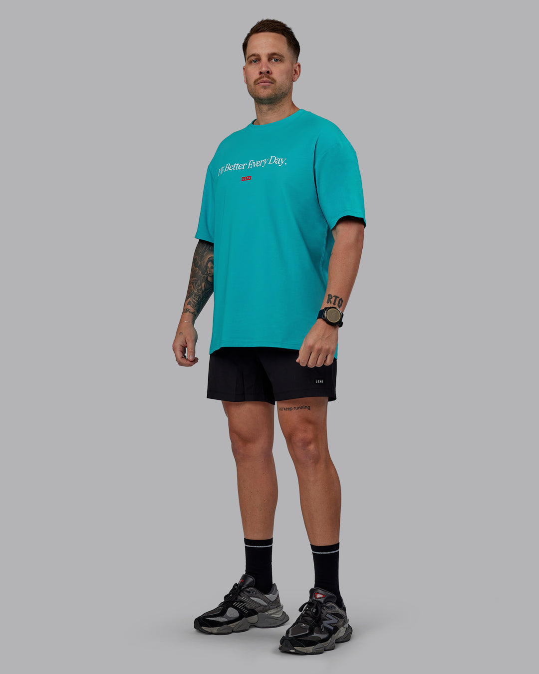 Man wearing Unisex 1% Better FLXCotton Tee Oversize - Blue Bird-White - view 12