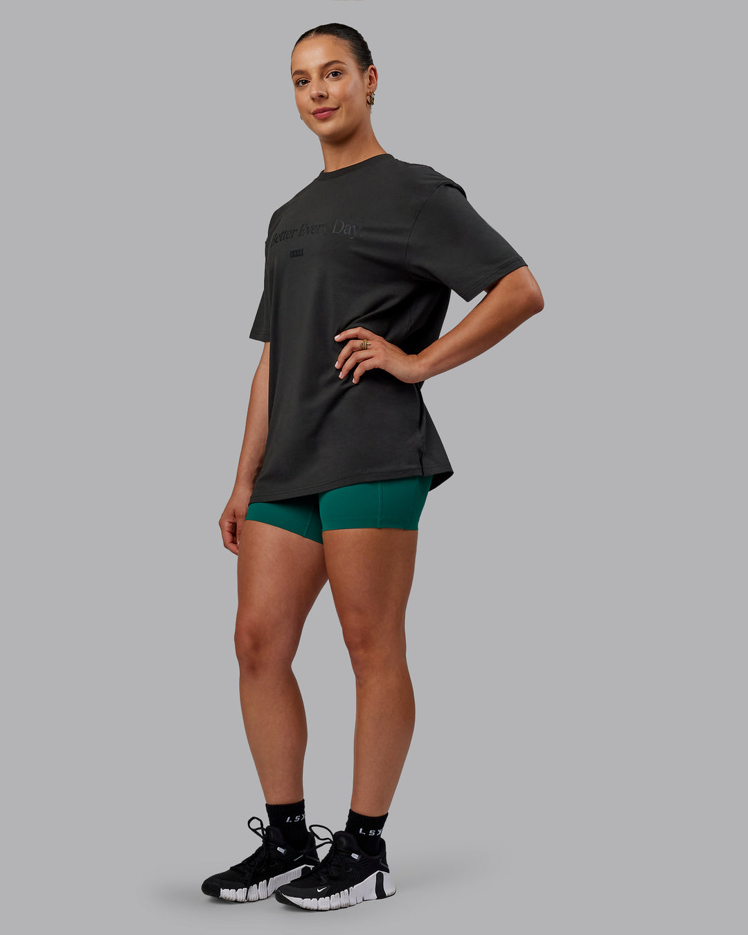 Woman wearing Unisex 1% Better FLXCotton Tee Oversize - Pirate Black-Black - view 5