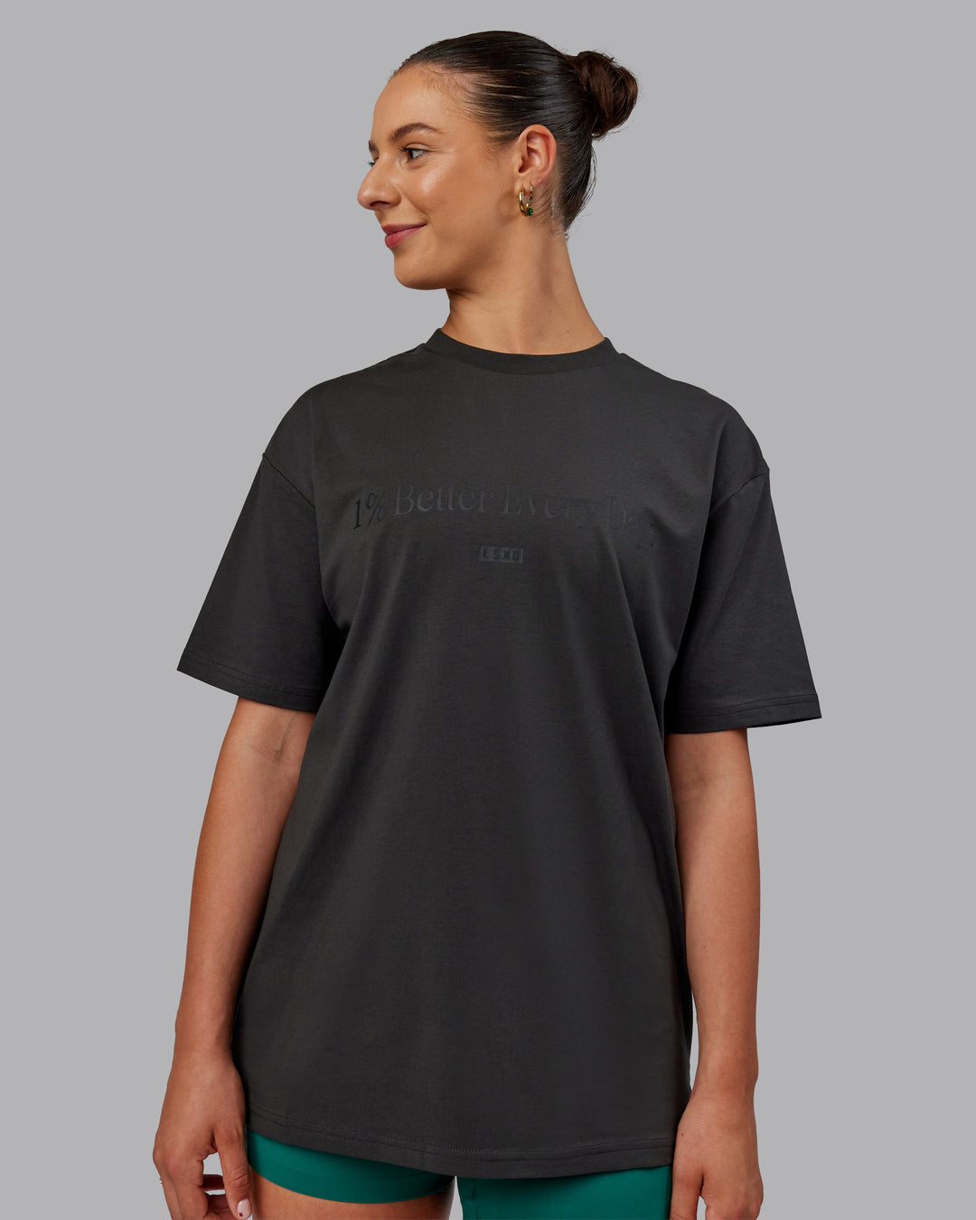 Woman wearing Unisex 1% Better FLXCotton Tee Oversize - Pirate Black-Black - view 3