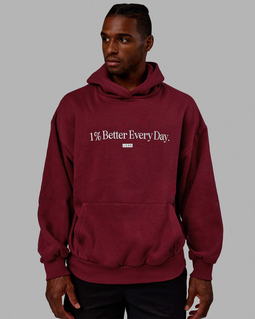 Man wearing Unisex 1% Better Hoodie Oversize - Cranberry-White - view 6