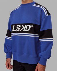 Man wearing Unisex A-Team Sweater Oversize - Power Cobalt-Black | Thumbnail Index: 9