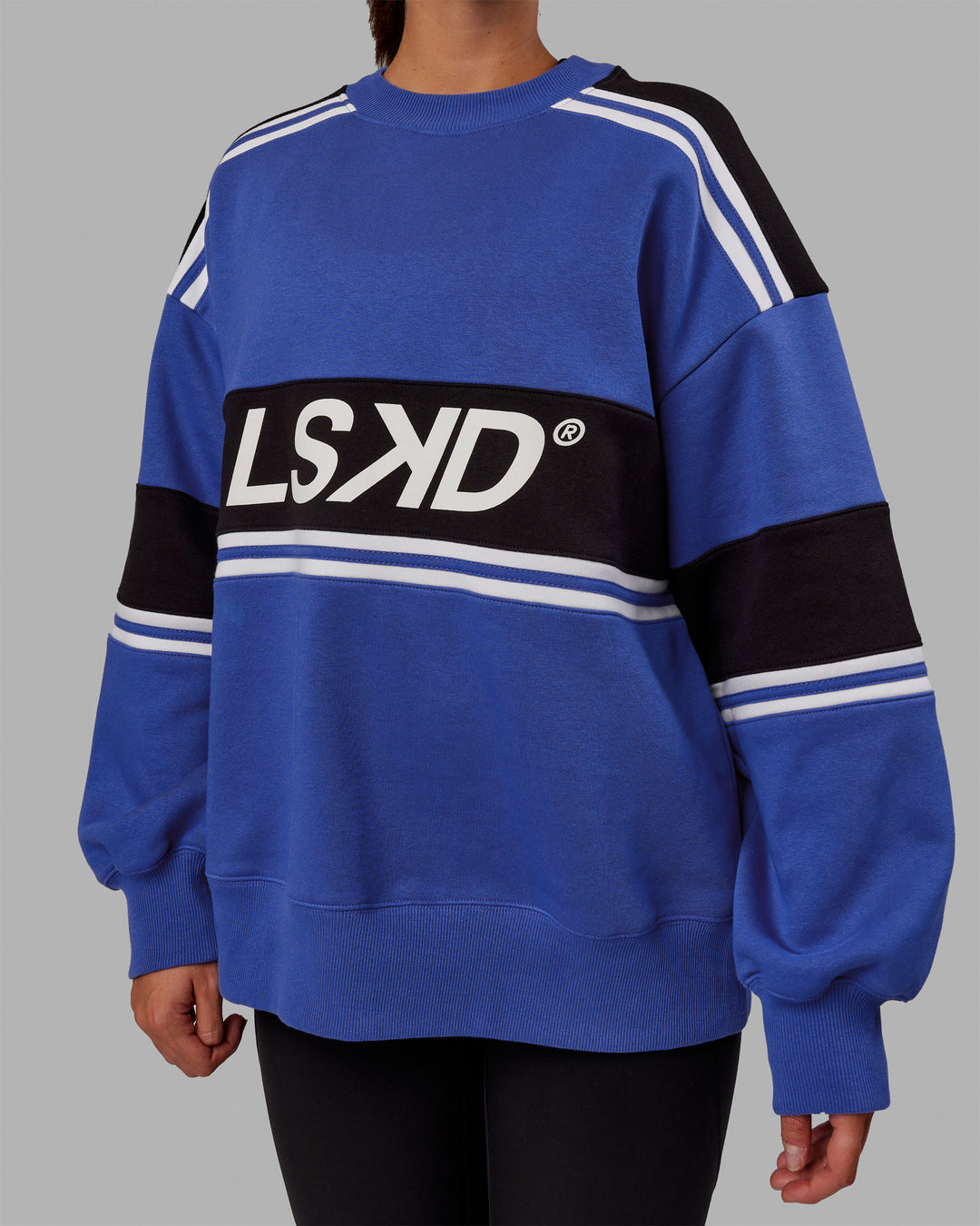 Woman wearing Unisex A-Team Sweater Oversize - Power Cobalt-Black - view 7