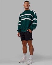 Man wearing Unisex Collateral Sweater Oversize - Dark Moss-White | Thumbnail Index: 5