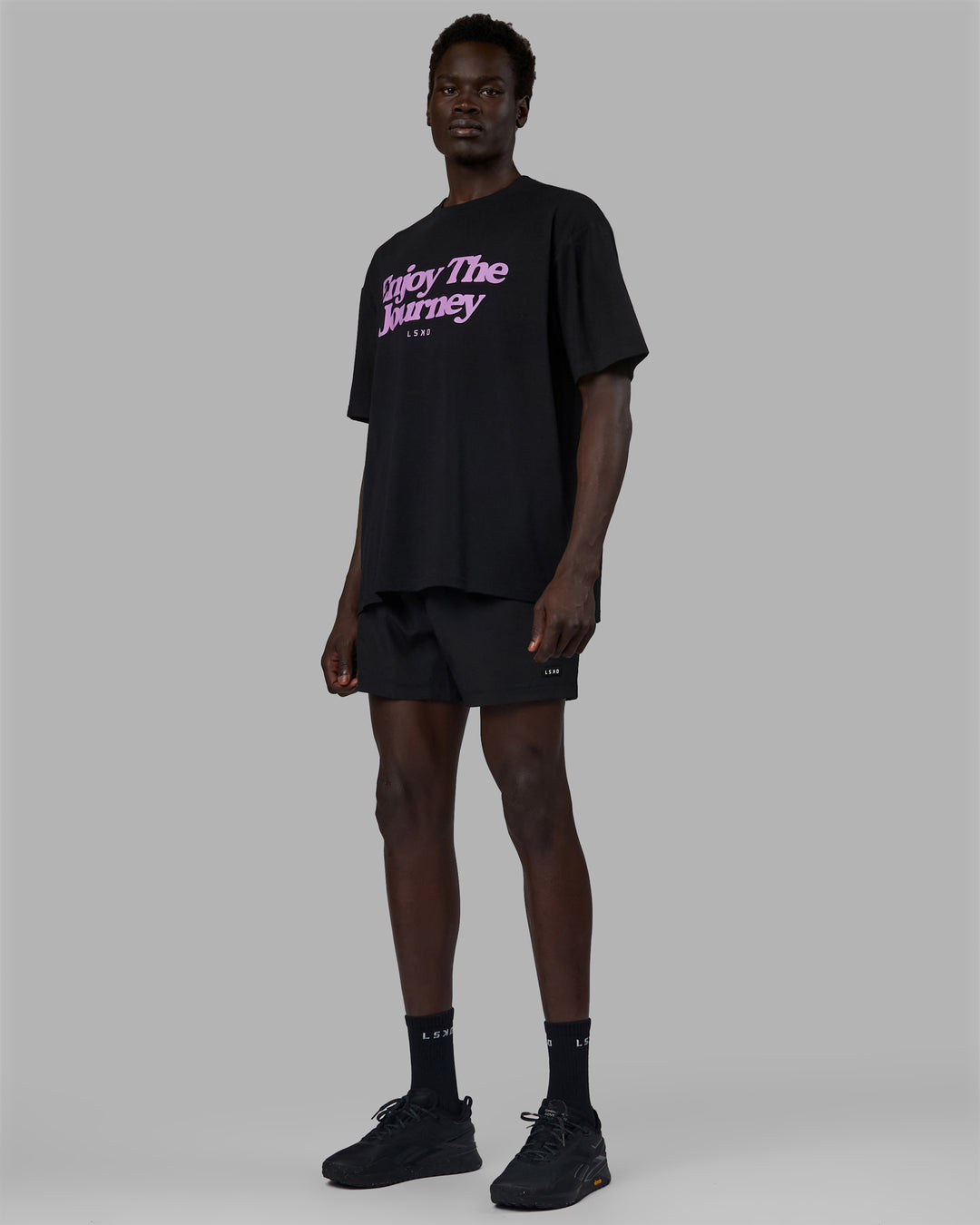 Man wearing Unisex Enjoy The Journey FLXCotton Tee Oversize - Black-Light Violet - view 3