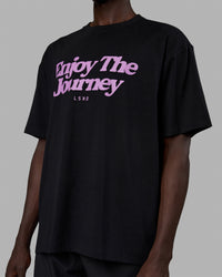 Man wearing Unisex Enjoy The Journey FLXCotton Tee Oversize - Black-Light Violet | Thumbnail Index: 8