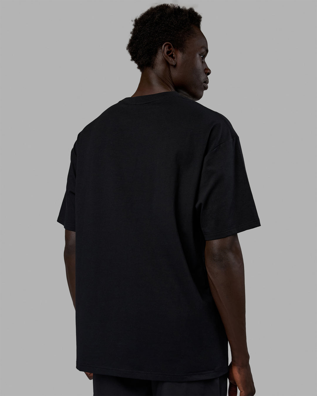 Man wearing Unisex Enjoy The Journey FLXCotton Tee Oversize - Black-Light Violet - view 7