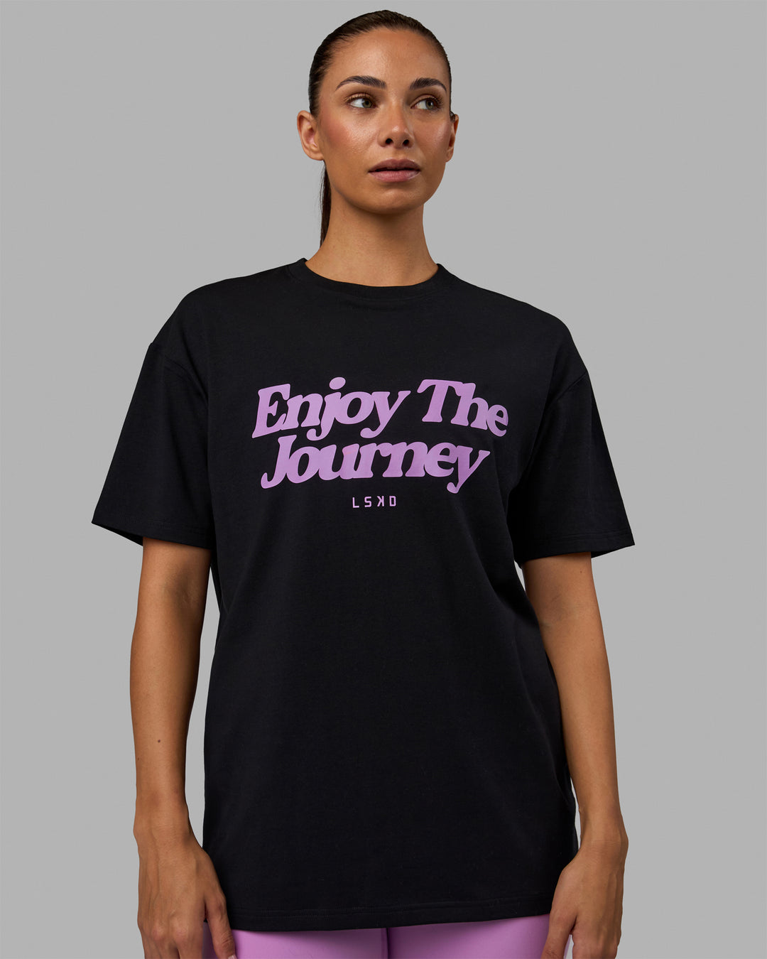 Woman wearing Unisex Enjoy The Journey FLXCotton Tee Oversize - Black-Light Violet - view 8