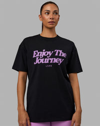 Woman wearing Unisex Enjoy The Journey FLXCotton Tee Oversize - Black-Light Violet | Thumbnail Index: 7